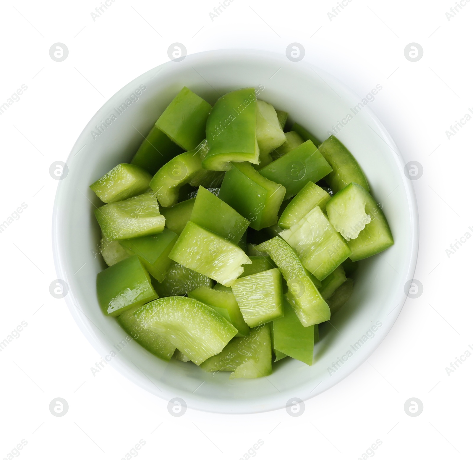 Pieces of fresh green bell peppers in bowl isolated on white, top view Photo of Pieces of fresh green bell peppers in bowl isolated on white, top view