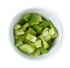 Photo of Pieces of fresh green bell peppers in bowl isolated on white, top view