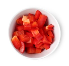 Photo of Pieces of fresh red bell peppers in bowl isolated on white, top view