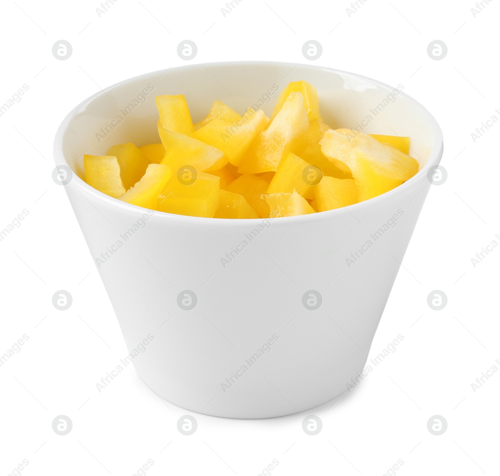 Pieces of fresh yellow bell peppers in bowl isolated on white Photo of Pieces of fresh yellow bell peppers in bowl isolated on white