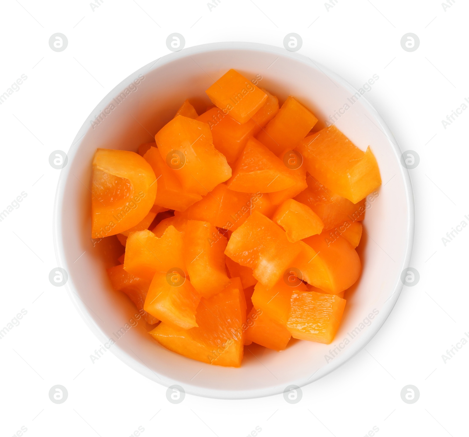 Photo of Pieces of fresh orange bell peppers in bowl isolated on white, top view