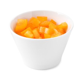 Photo of Pieces of fresh orange bell peppers in bowl isolated on white