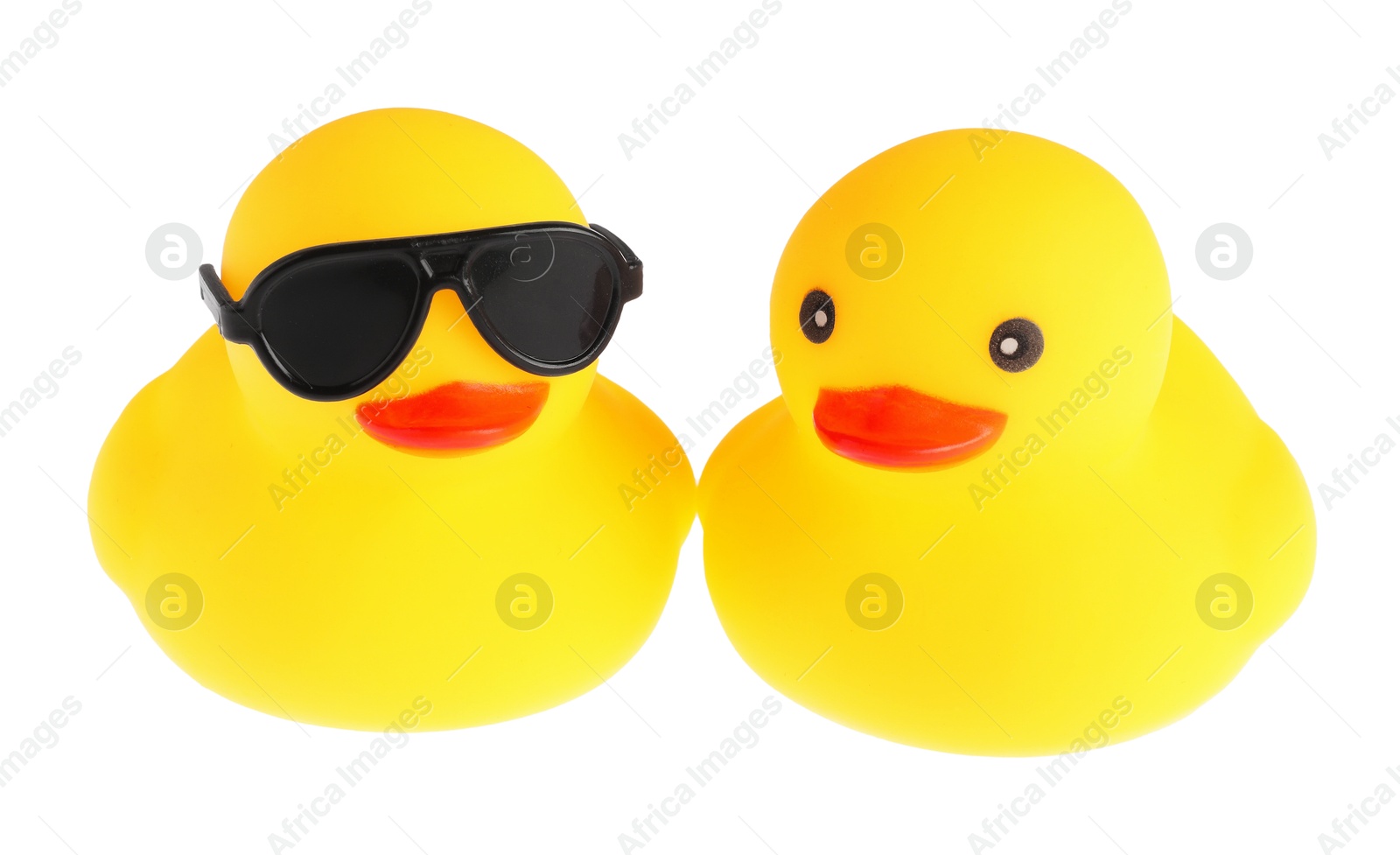 Cute rubber ducks isolated on white. Children's toy Photo of Cute rubber ducks isolated on white. Children's toy