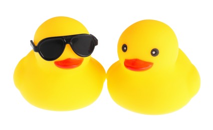 Photo of Cute rubber ducks isolated on white. Children's toy