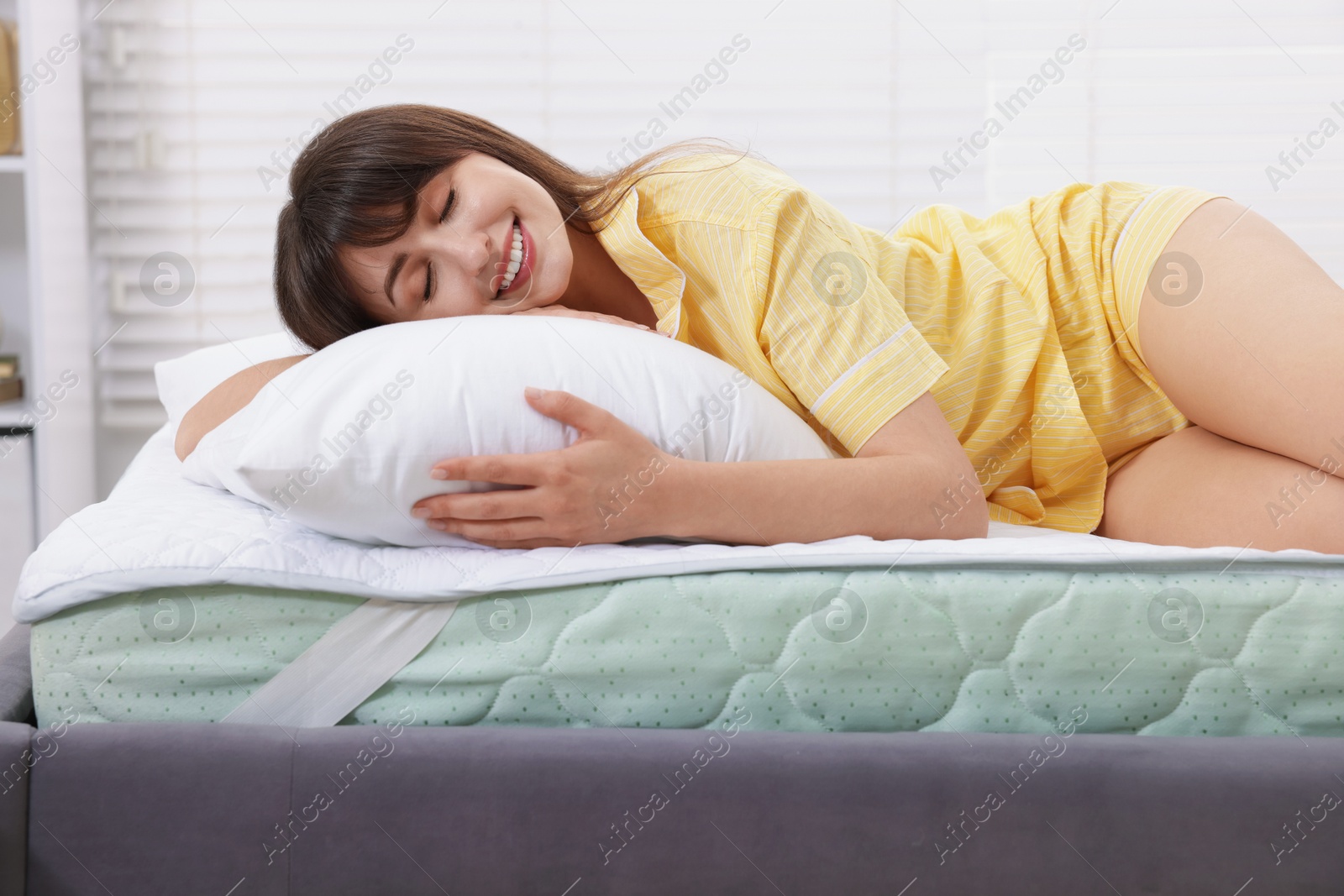 Beautiful woman sleeping in bed at home Photo of Beautiful woman sleeping in bed at home
