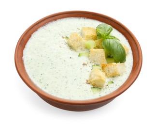 Photo of Tasty cucumber soup with croutons and basil isolated on white