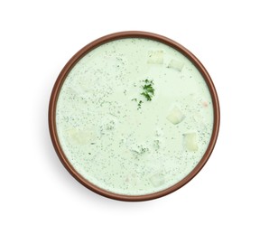 Photo of Tasty cucumber soup with parsley isolated on white, top view
