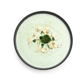 Photo of Tasty cucumber soup with croutons and broccoli isolated on white, top view