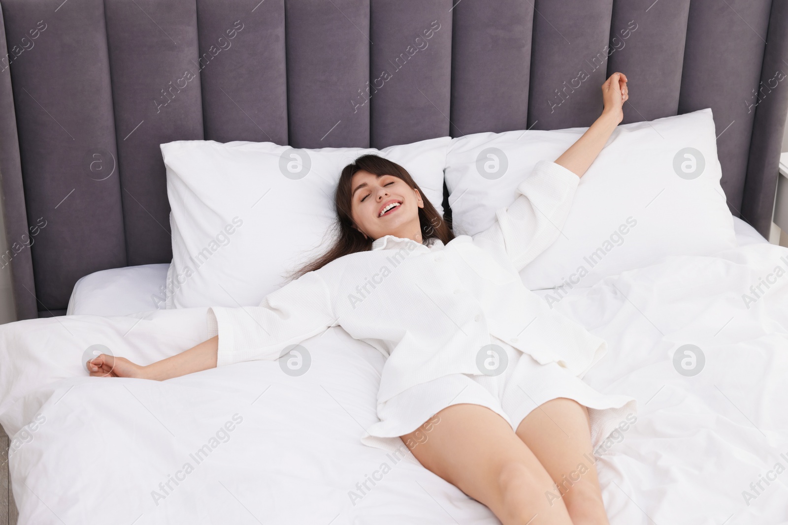 Beautiful woman sleeping in bed at home Photo of Beautiful woman sleeping in bed at home