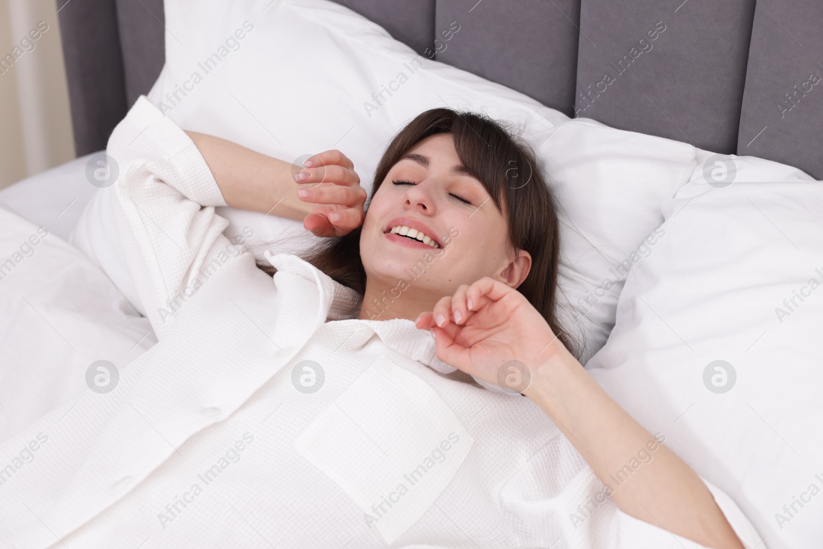 Beautiful woman sleeping in bed at home Photo of Beautiful woman sleeping in bed at home