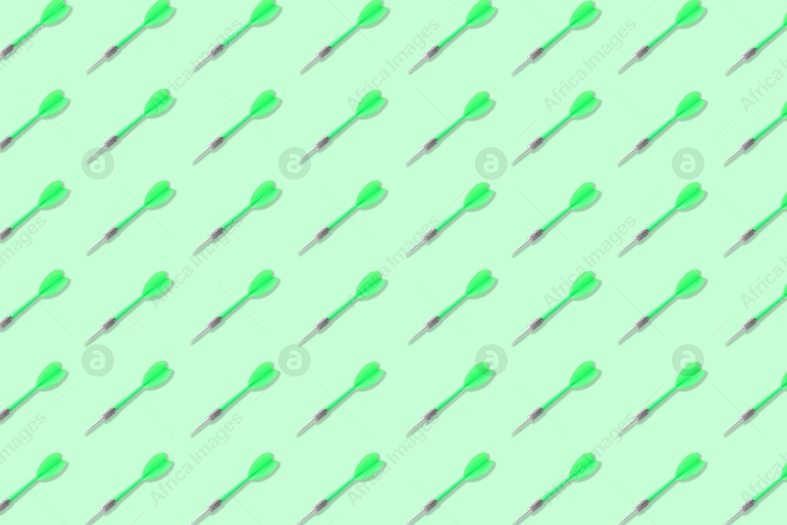Image of Pattern of darts on light green background