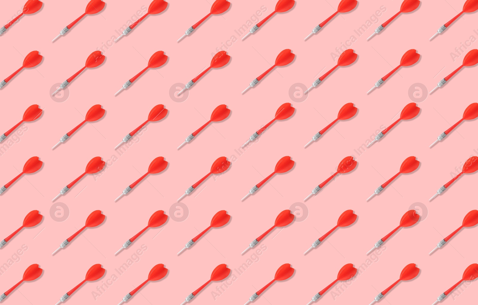 Pattern of darts on light red background Image of Pattern of darts on light red background