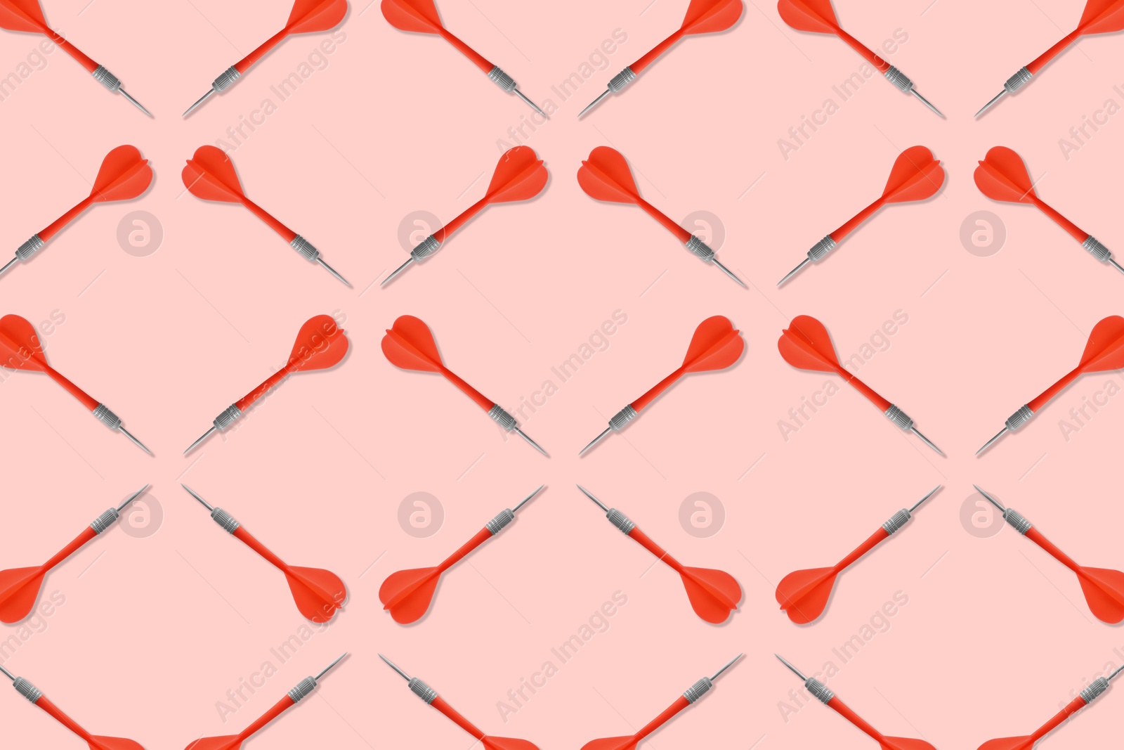 Pattern of darts on light red background Image of Pattern of darts on light red background