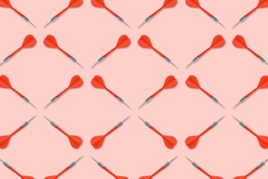 Image of Pattern of darts on light red background