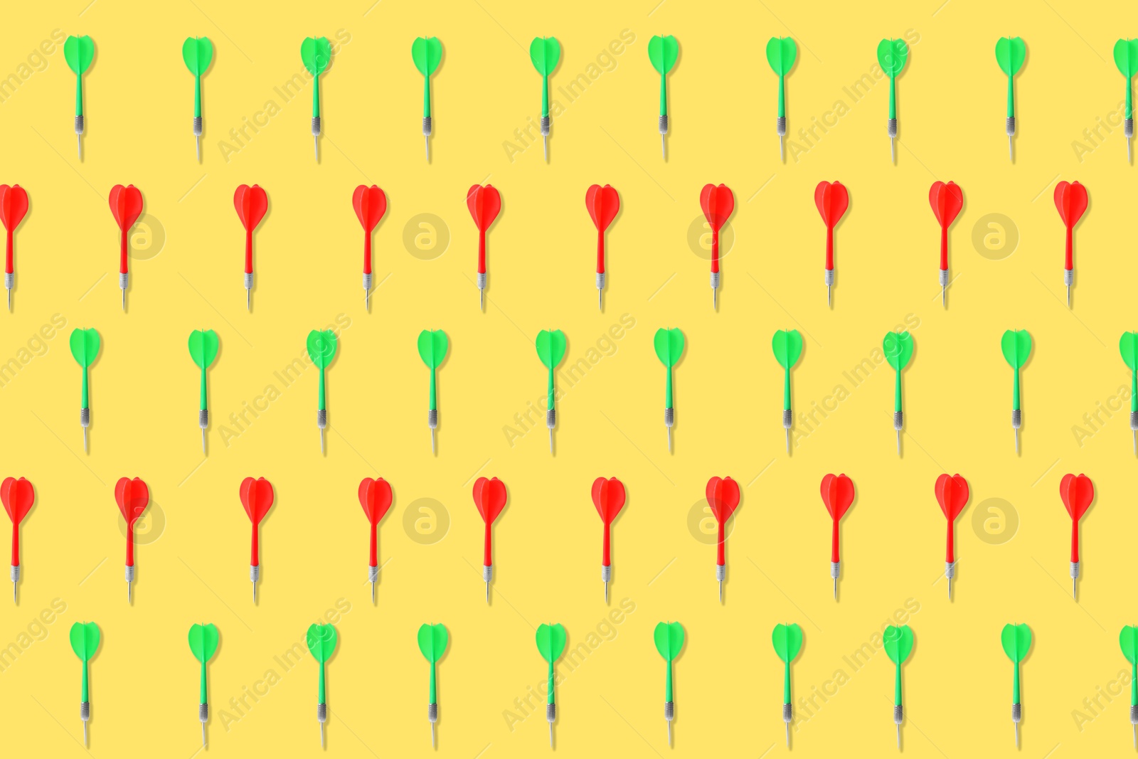 Pattern of darts on pale orange background Image of Pattern of darts on pale orange background