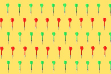 Image of Pattern of darts on pale orange background
