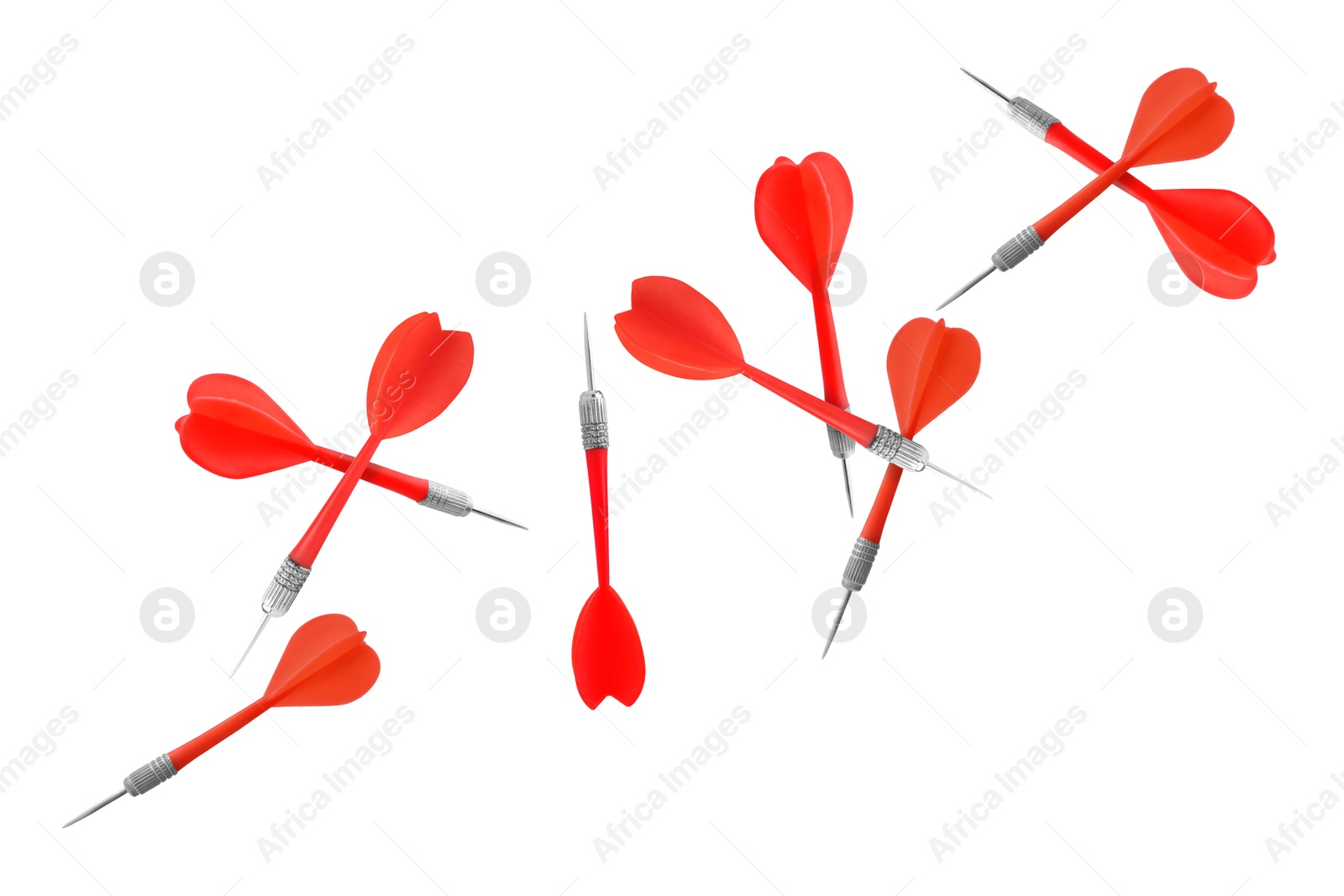 Red darts in air on white background Image of Red darts in air on white background