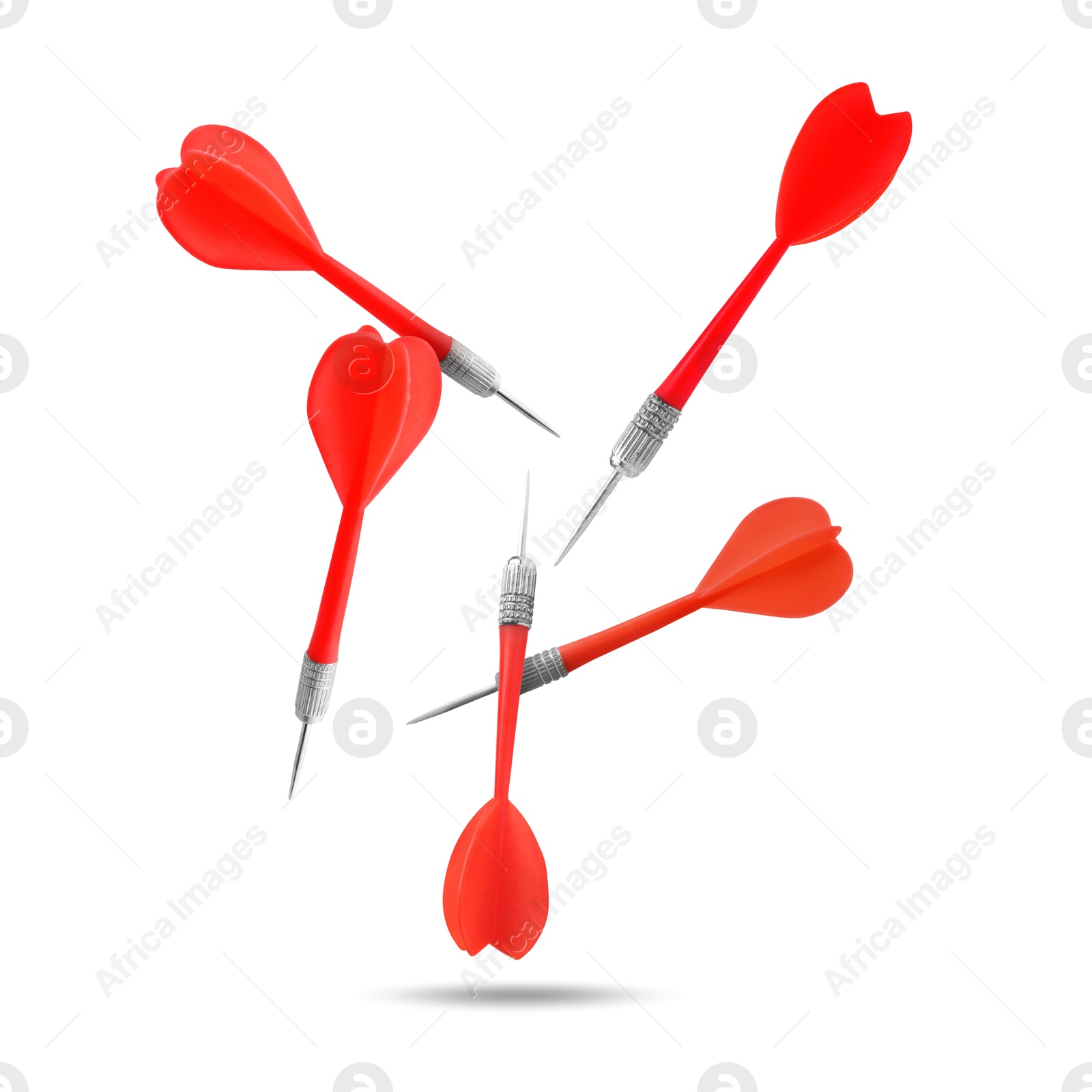 Red darts in air on white background Image of Red darts in air on white background