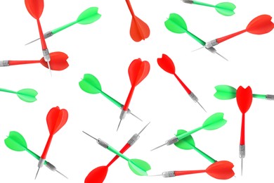 Image of Red and green darts flying on white background
