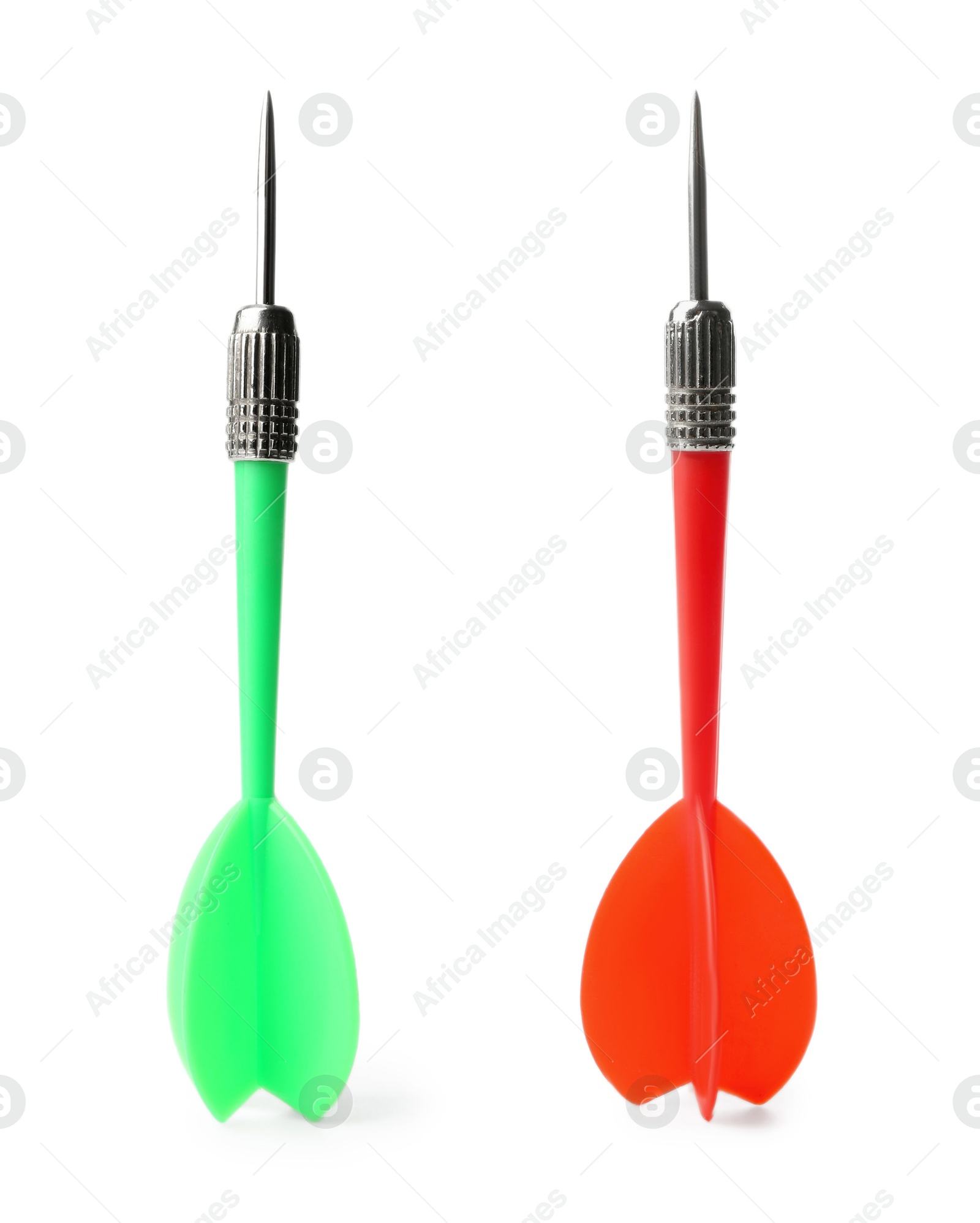 Red and green darts on white background Image of Red and green darts on white background