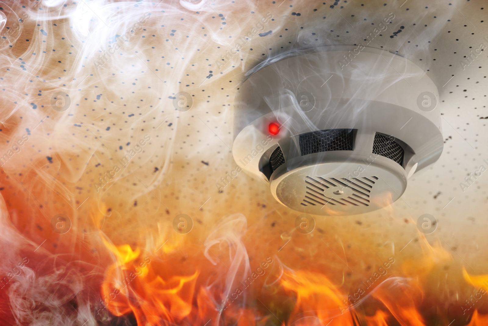 Fire alarm system. Detector on ceiling triggered by smoke and flame Image of Fire alarm system. Detector on ceiling triggered by smoke and flame