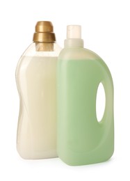 Photo of Bottles of fabric softener isolated on white