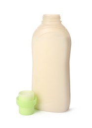 Photo of Bottle of fabric softener isolated on white