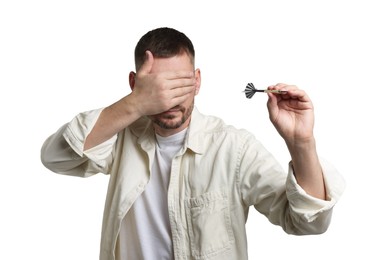 Photo of Targeting. Man with dart covering eyes on white background