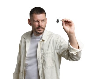 Photo of Targeting. Man with dart aiming on white background