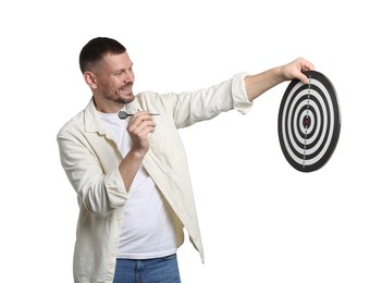 Photo of Targeting. Man with dart board and arrow on white background