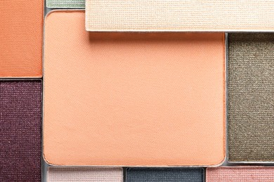 Photo of Beautiful eye shadow refill pans as background, top view