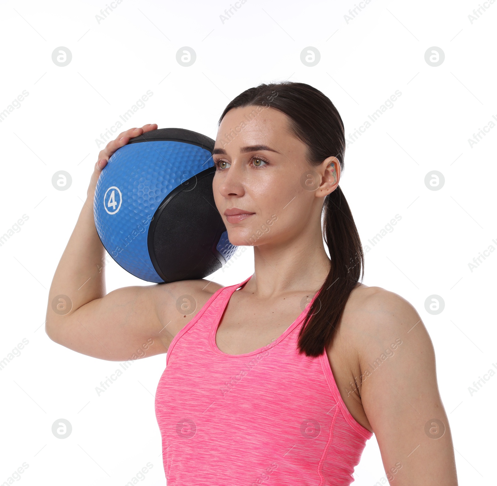 Woman with medicine ball on white background Photo of Woman with medicine ball on white background