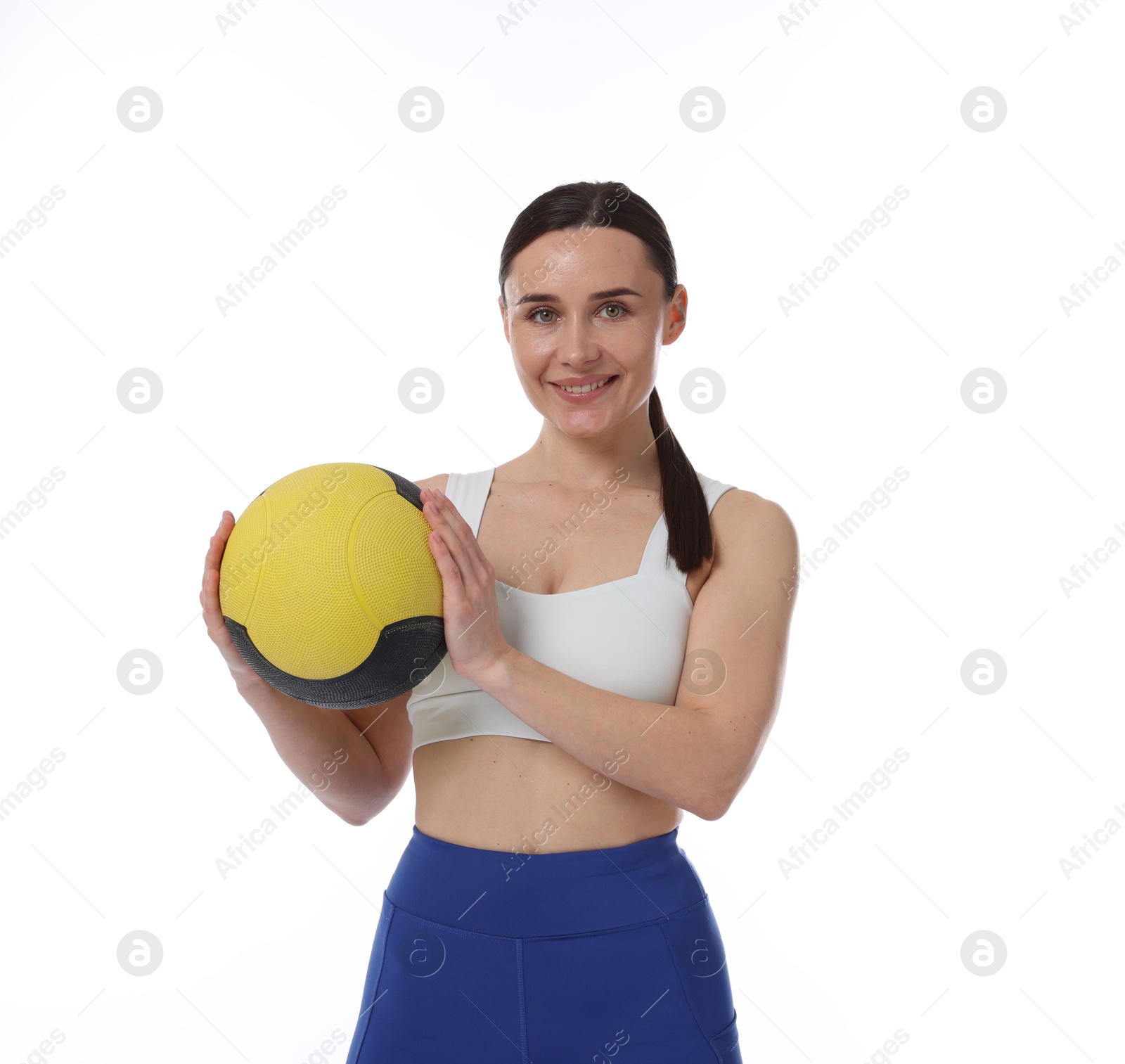 Woman with medicine ball on white background Photo of Woman with medicine ball on white background