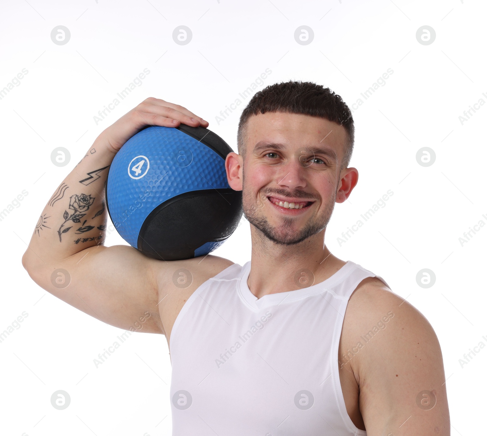 Man with medicine ball on white background Photo of Man with medicine ball on white background
