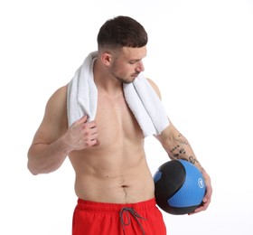 Photo of Man with medicine ball and towel on white background