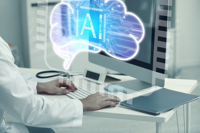 Image of Doctor using computer with AI virtual screen at table, closeup. Artificial intelligence in medicine
