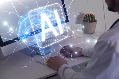 Image of Doctor using computer with AI virtual screen at table, closeup. Artificial intelligence in medicine