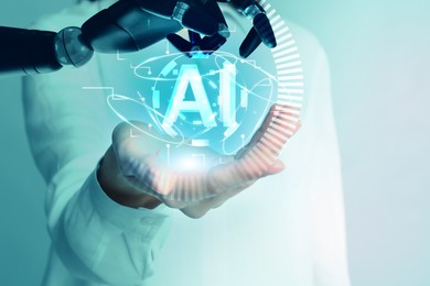 Illustration of Robot hand and doctor with virtual AI abbreviation against background, closeup. Artificial intelligence in medicine