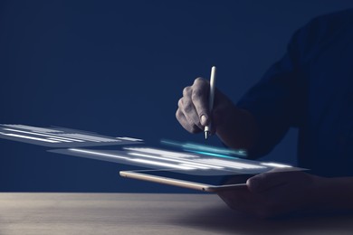 Illustration of Electronic signature. Man working with stylus pen on virtual screen above tablet computer, closeup