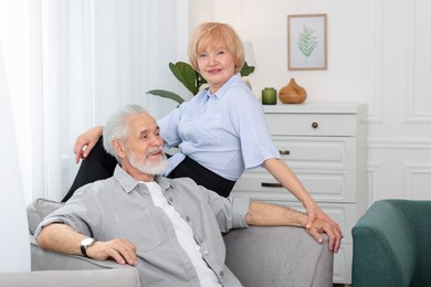 Photo of Lovely senior couple spending time together at home