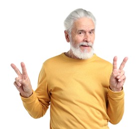 Photo of Elderly man showing v-signs on white background