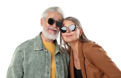 Photo of Senior couple in stylish outfits on white background