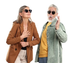 Photo of Senior couple in stylish outfits on white background