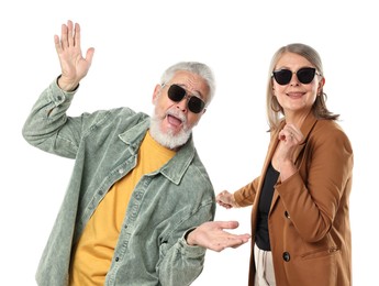 Photo of Senior couple in stylish outfits on white background