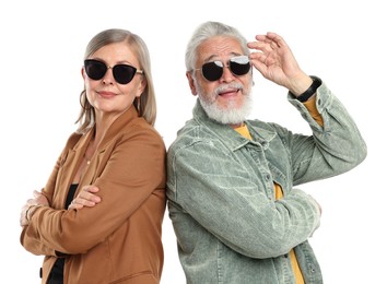 Photo of Senior couple in stylish outfits on white background