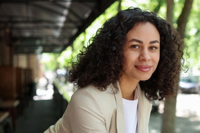 Photo of Portrait of beautiful Latin American woman outdoors