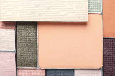 Photo of Beautiful eye shadow refill pans as background, top view