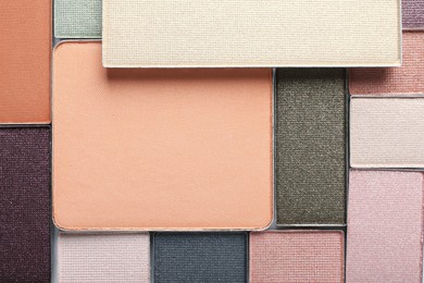 Photo of Beautiful eye shadow refill pans as background, top view