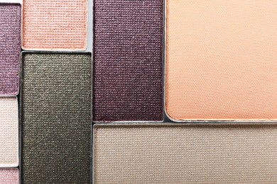 Photo of Beautiful eye shadow refill pans as background, top view