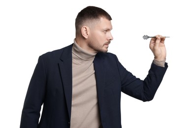 Photo of Targeting. Man with dart aiming on white background